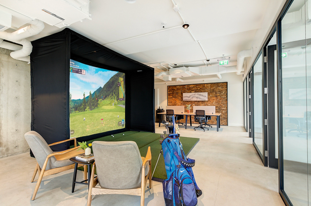 Gold SIM, Office Space, cork wall, desk, commercial renovation, glass offices, seating area, golf