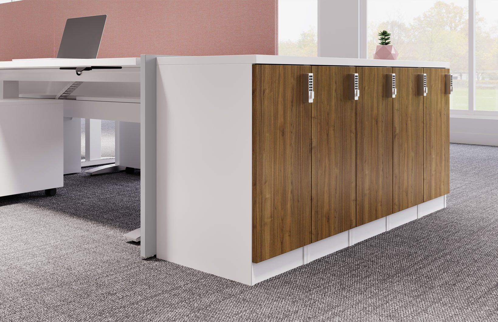 White desk and wood cabinet with handles, office background with a modern design.