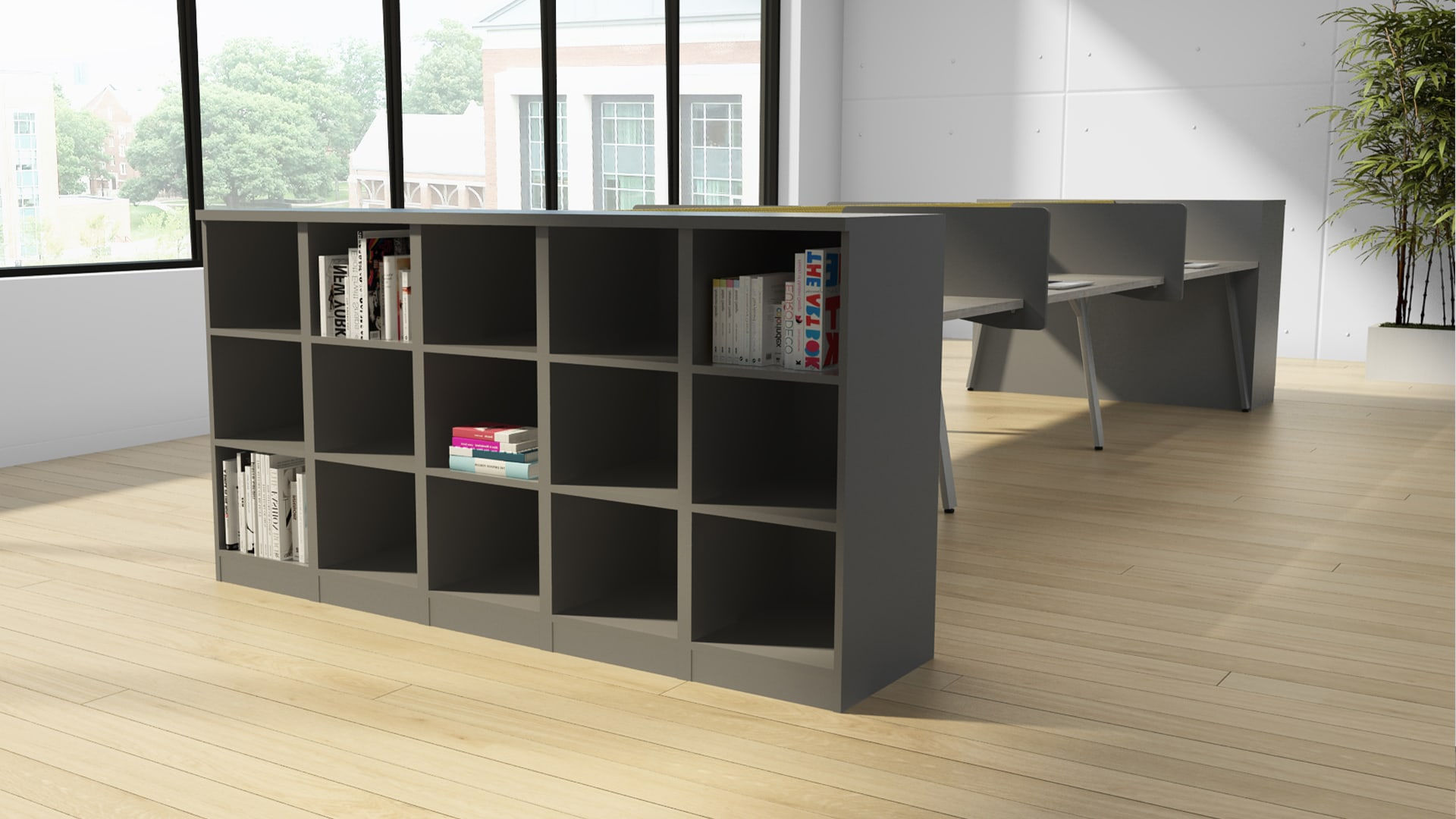 Gray cubicle with shelves filled with books and items, modern office design