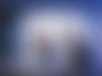 Two people point at different floors on the ISE 2025 Floorplan