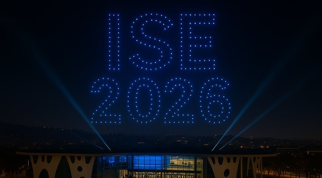 Blue drones in a night sky creating the words "ISE 2026"