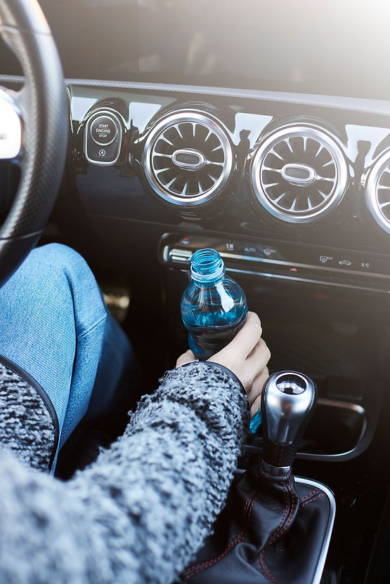 Flasche_im_Auto.jpg