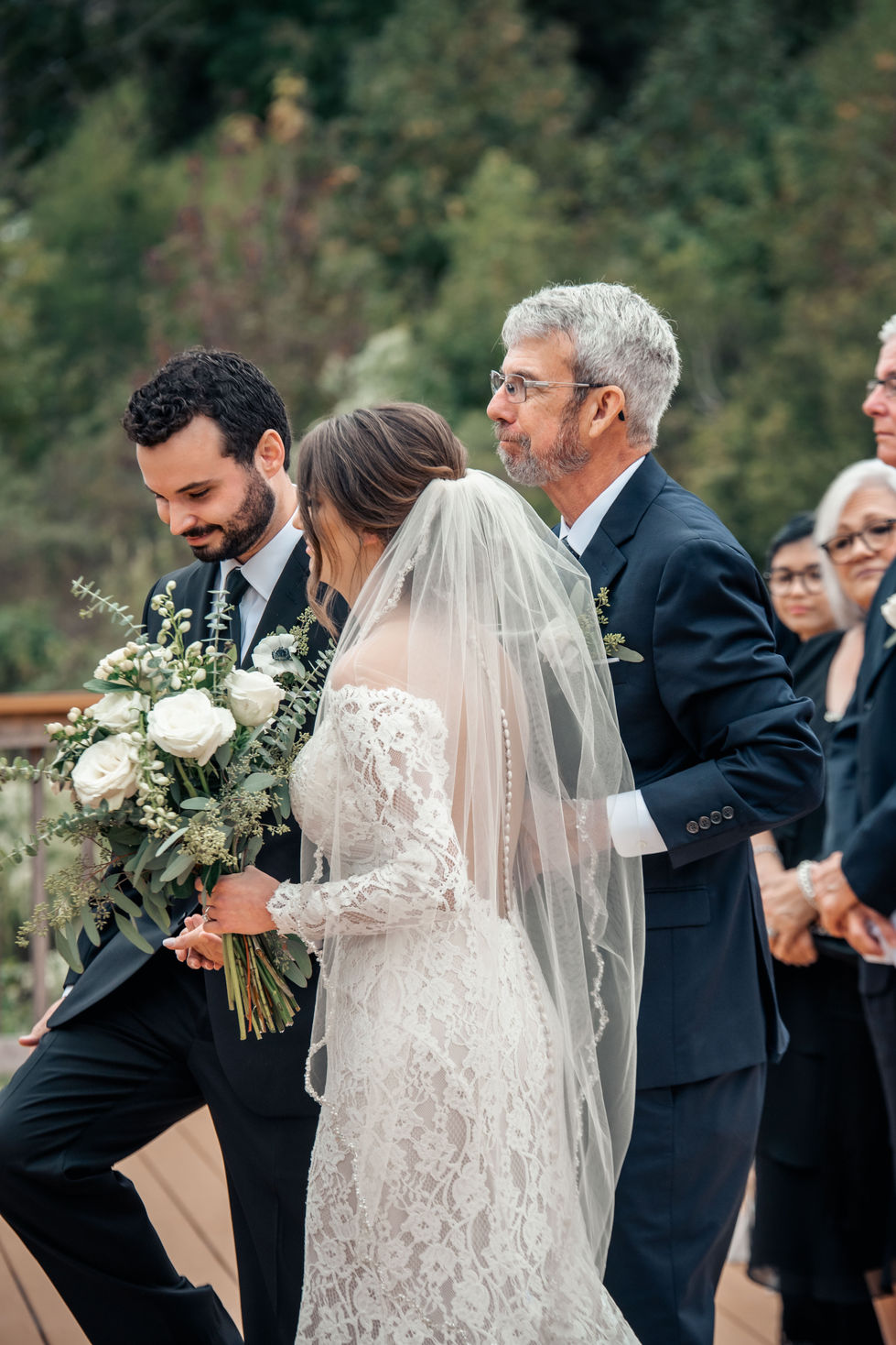 Bride arriving at the altar with her father