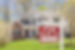 Home For Sale Real Estate Sign and Beautiful New House..jpg