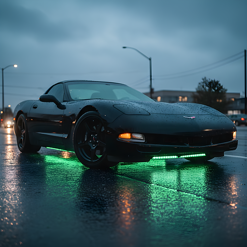 create me a very realistic black c5 corvette in the rain with green exterior led lights .p