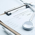 medical-examination-report-stethoscope-white-desktop.jpg