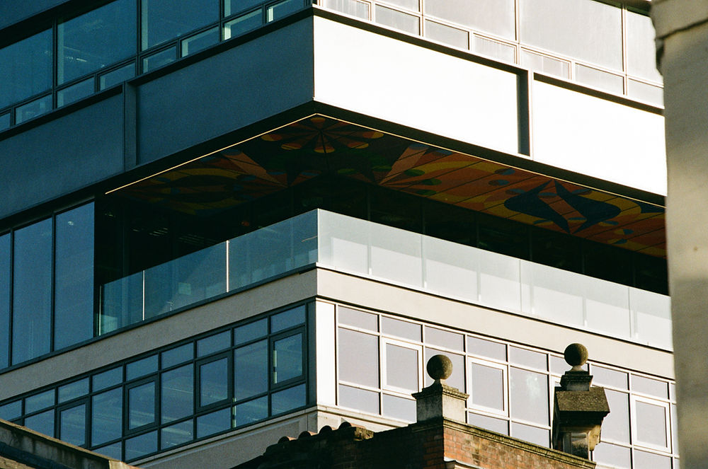 Modern London street photography of layered architecture.
