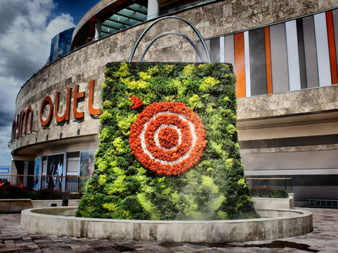 Commercial landscaping project featuring living wall installation by Quant Landscaping