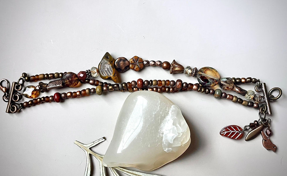 Miniatura: Necklace with beads and a large white stone on white background jewelry.