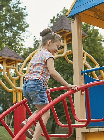 Kind op de speelplaats