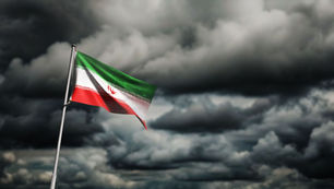 Dark clouds and Iranian flag