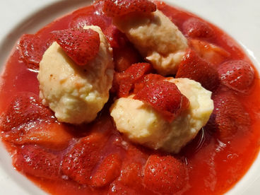 Luxurious Ricotta Dumplings with Strawberry Sauce