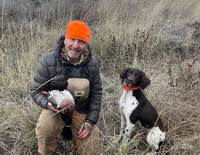 Mark hunting with his pup Lucy