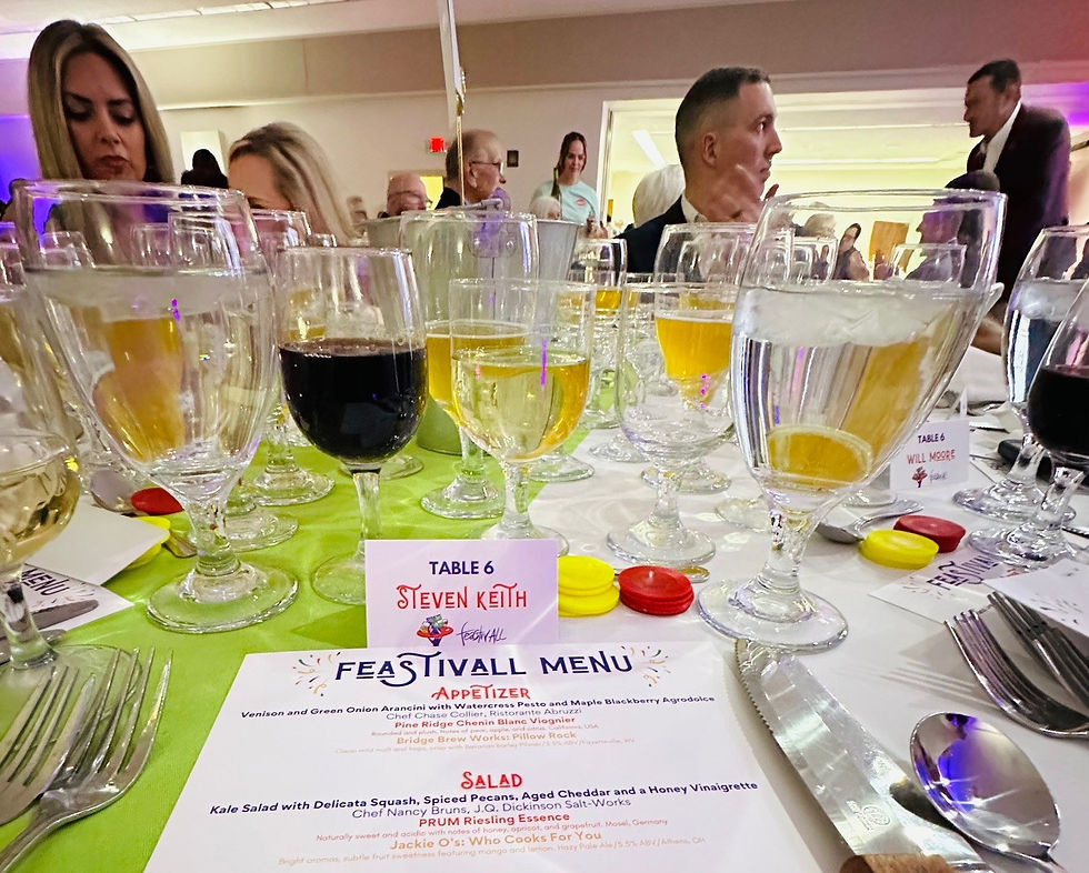 Beer and wine glasses fill a table
