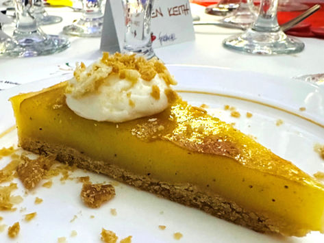 Old-fashioned vinegar pie with whipped cream and crumbles