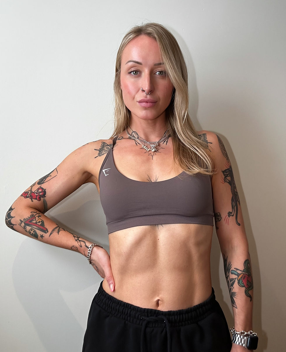 Louka Fitness women's personal trainer in workout clothing