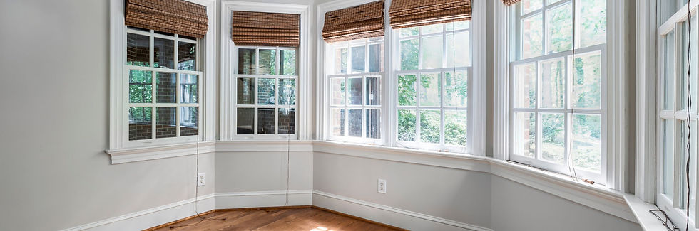Modern windows installed in a bright residential living room.