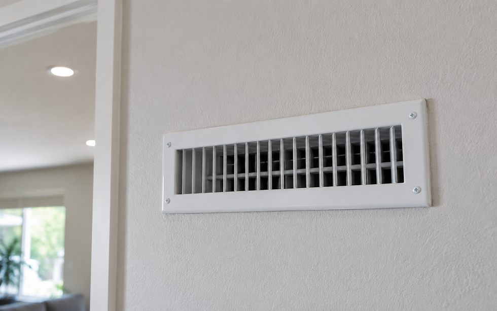 residential HVAC air filter being held up to
the light, or a white HVAC vent grille on an interior wall of a Southern California home