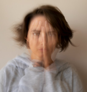 blurry-woman-dealing-with-anxiety-front-view.jpg