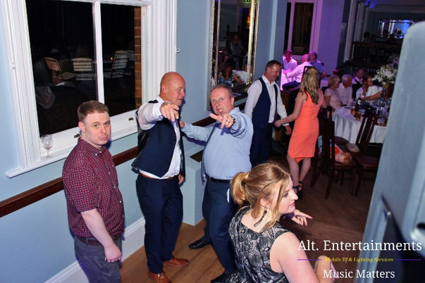 Euphoric scene as wedding guests dance joyfully at Pendrell Hall, Codsall, Staffordshire, captured by Alt. Entertainments, a leading Wedding DJ/Mobile DJ, Disco, and Events Company.
