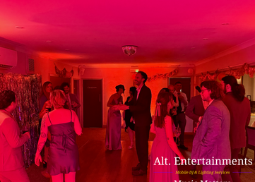 Wedding guests dancing during an evening reception at Sutton Coldfield Golf Club in Sutton Coldfield, West Midlands, with DJ entertainment provided by Alt. Entertainments Wedding DJ services.