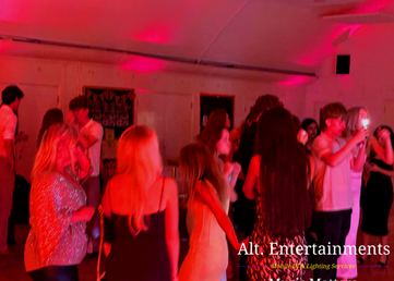 Guests dancing at an 18th birthday party at St James Church Centre, Mere Green, Sutton Coldfield, with music and professional DJ entertainment by Alt. Entertainments.