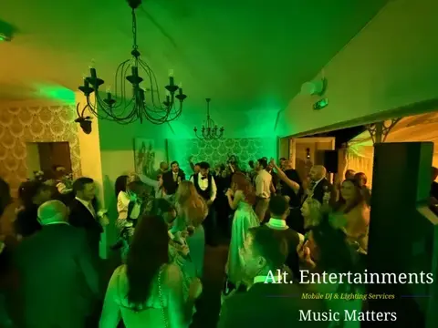 Bride and groom sharing their first dance at a wedding reception at St. John’s House in Lichfield, Staffordshire, with music and entertainment provided by Alt. Entertainments Wedding DJ & Mobile DJ company.