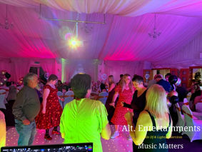 Guests dancing at a lively birthday party at Calderfields Golf & Country Club, Aldridge, Walsall, with DJ entertainment by Alt. Entertainments.