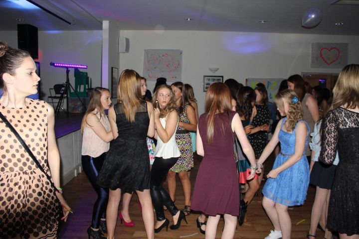 Dynamic dancers bring the celebration to life at a birthday disco in Blymhill & Western Under Lizard Village Hall. Captured by Alt. Entertainments, a premier mobile DJ, Disco & Events Company.