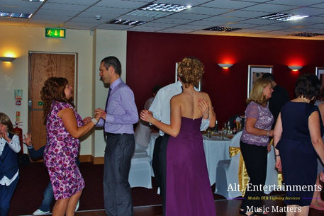 Guests dancing and celebrating at a wedding reception venue, The Ramada (Now the Holiday Inn) in Cannock, captured by Alt. Entertainments, a mobile DJ, Disco & Events company.