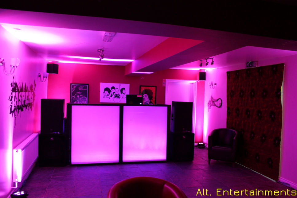 A captivating view of a mobile DJ setup bathed in enchanting purple light, infusing the atmosphere at Jaspers in Shifnal, Telford, with an aura of mystique. Photograph courtesy of Alt. Entertainments, a trusted mobile DJ, Disco, and Events company.