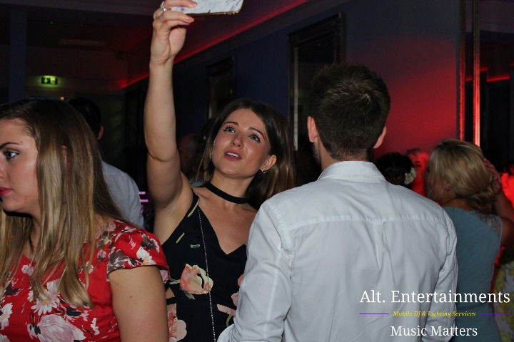 Wedding guests dance joyfully at Pendrell Hall, Codsall, captured by Alt. Entertainments, a renowned Wedding DJ/Mobile DJ, Disco, and Events Company.