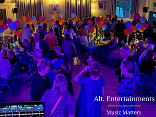 Guests dancing on a packed dancefloor at a birthday party at Woodhouse Eaves Village Hall in Leicestershire, with professional DJ entertainment provided by Alt. Entertainments.