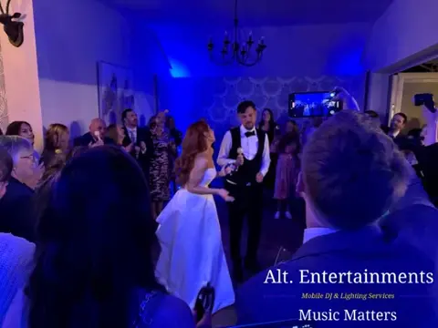 Bride and groom sharing their first dance at a wedding reception at St. John’s House, Lichfield, Staffordshire, with music by Alt. Entertainments Wedding DJ & Mobile DJ.