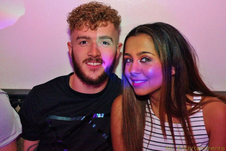 A lively crowd gathers at Studley Cricket Club in Redditch, Worcestershire, to celebrate a birthday party in style. Captured by Alt. Entertainments, a mobile DJ, disco, and events provider, the scene is filled with vibrant decorations and infectious joy.