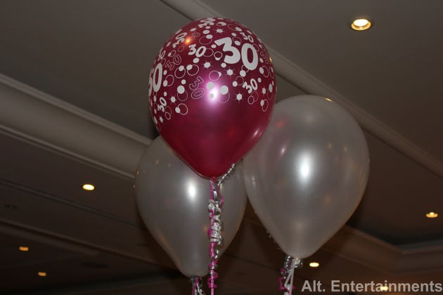 A captivating array of party favours and decorations adorns Tillington Hall in Stafford, Staffordshire, setting the stage for an unforgettable celebration. Expertly captured by Alt. Entertainments, a Mobile DJ, Disco & Events Company.