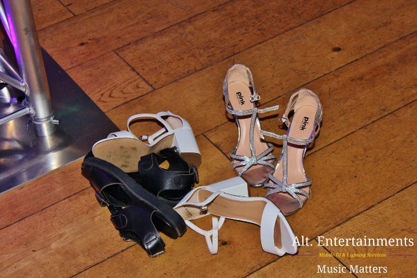 Stylish footwear adorns the dance floor at Pendrell Hall Wedding Reception in Codsall, Staffordshire, captured by Alt. Entertainments, a leading Wedding DJ/Mobile DJ, Disco, and Events Company.