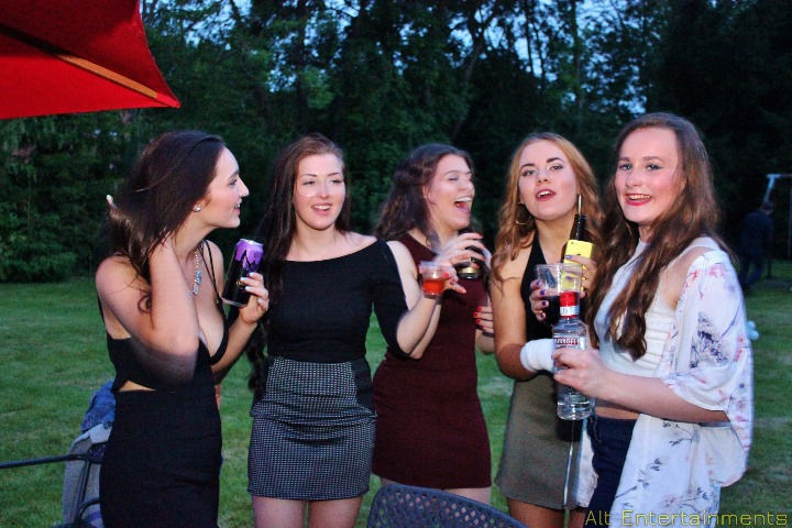 A dynamic crowd celebrates an 18th birthday party at a private event in Yoxall, Staffordshire, hosted by Alt. Entertainments, a Mobile DJ, Disco & Events Company.