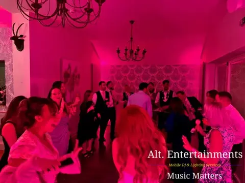 Guests enjoying the dance floor at a wedding reception at St. John’s House in Lichfield, Staffordshire, with entertainment provided by Alt. Entertainments Wedding DJ and Mobile DJ company.