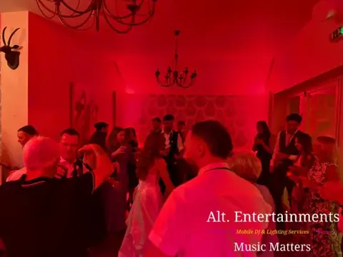 Guests dancing at a wedding reception at St. Johns House, Lichfield, with music and entertainment by Alt. Entertainments, a professional wedding DJ and mobile DJ events company.