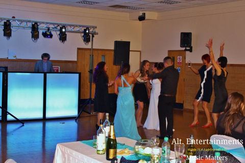 A mesmerizing scene unfolds at the Wellington Civic & Leisure Centre in Telford, Shropshire, as dancers bring the dance floor to life. Photograph by Alt. Entertainments, a trusted Wedding DJ/Mobile DJ, Disco & Events Company.