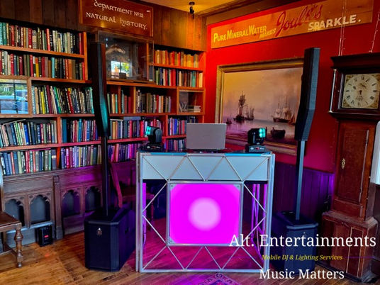 Alt. Entertainments' mobile DJ setup at The Crown Joules in Codsall, Wolverhampton, fills the venue with pulsating beats and lively energy. Professional equipment and dynamic lighting create an electrifying atmosphere, perfect for dancing and celebrating.
