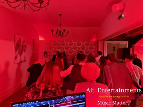 Guests enjoying the dance floor during a wedding party at St. John’s House in Lichfield, Staffordshire, with music and entertainment by Alt. Entertainments Wedding DJ and Mobile DJ company.