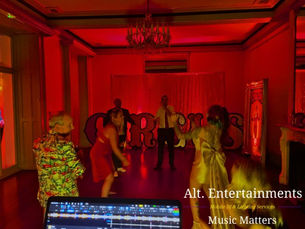 Guests dancing joyfully at a wedding disco at Garthmyl Hall, Montgomery, Wales. The photo, taken by Alt. Entertainments, showcases a lively dance floor with dynamic lighting and elegant venue décor, reflecting the vibrant atmosphere created by their Mobile DJ, Wedding DJ, Indie DJ, and Alternative DJ services.