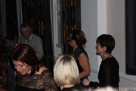 A group of dancers performs with grace and energy at the Christmas party held at Brocton Hall, Staffordshire, captured by Alt. Entertainments. Their captivating movements add to the festive ambiance, creating lasting memories for guests.