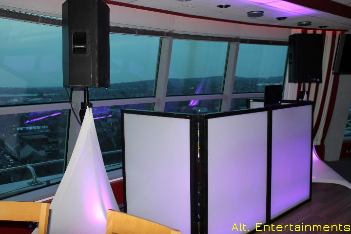 A professional mobile DJ setup at The Sky Bar, Ramada (Now Holiday Inn), crafted by Alt. Entertainments Mobile DJ, Disco & Events, featuring state-of-the-art equipment and dynamic lighting for an electrifying atmosphere.