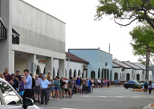 An early crowd awaits there turn to shop at Aldi