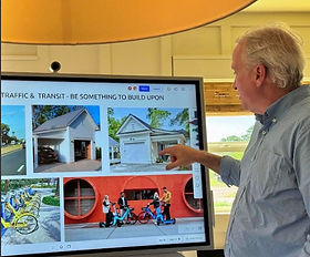 John Hillman reviews concept plans for Sea Grove Village