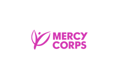 Mercy Corps logo in pink.