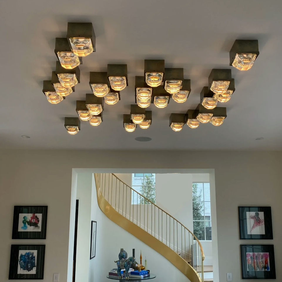 Custom Glass ceiling lamp. Made from brass and cast glass.